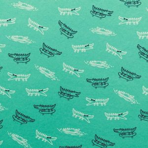 Apparel Fabric |  1yd Green Gators on Skateboards Jersey Knit Fabric