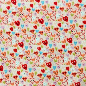 Holiday Fabric |  1yd Pink All Over Hearts Foil Cotton Interlock Knit Fabric